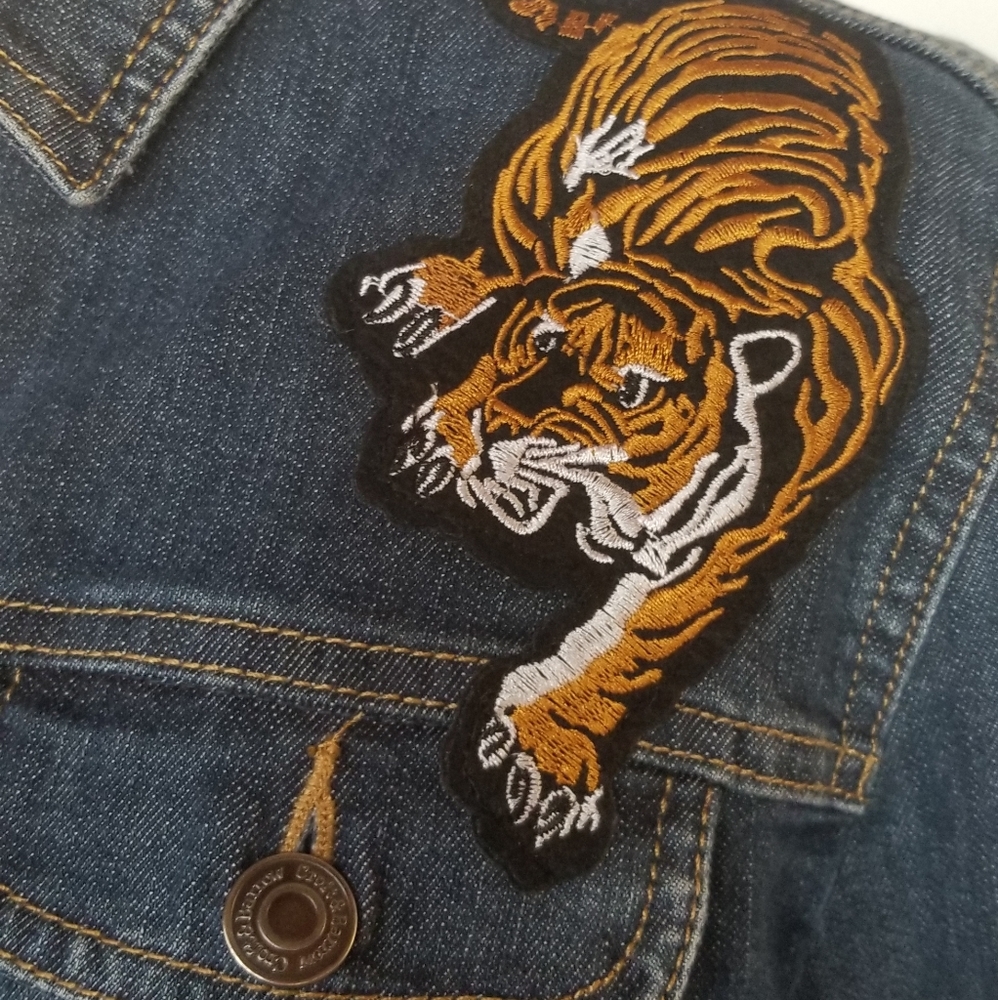 Large Denim jacket upcycled with tiger patch.